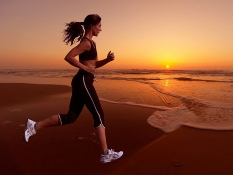 woman running during sunset